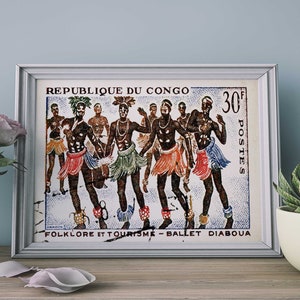 May include: A vintage postage stamp from the Republic of Congo featuring a colorful illustration of dancers in traditional attire performing the Ballet Diaboua. The stamp is labeled "30F POSTES" and reads "Folklore et Tourisme - Ballet Diaboua".