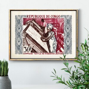 May include: A vintage postage stamp from the Republic of Congo featuring a red and blue design. The stamp depicts two people working in a textile factory. The stamp reads "REPUBLIQUE DU CONGO" and "COMPLEXE TEXTILE DE KINSHOUNDI SOTEXCO".