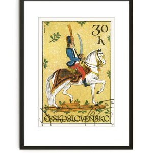 May include: A vintage Czechoslovakian postage stamp featuring a colorful illustration of a soldier on horseback. The stamp is yellow with green accents and reads "30 h" and "CESKOSLOVENSKO".