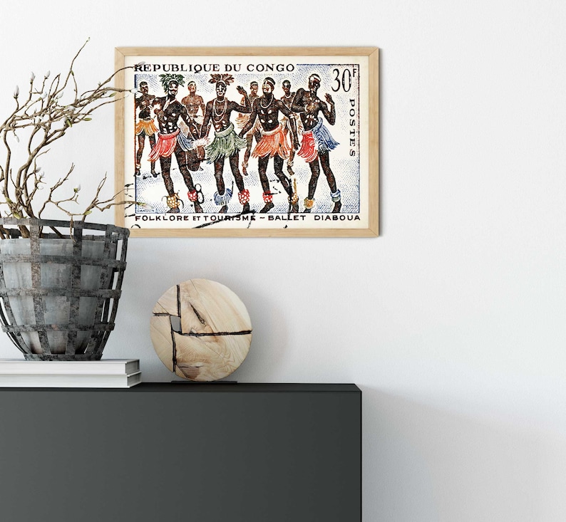 May include: A vintage postage stamp from the Republic of Congo featuring a colorful illustration of dancers in traditional costumes. The stamp reads "Folklore et Tourisme - Ballet Diaboua" and "30f Postes".