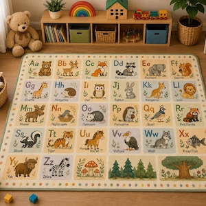 May include: A rectangular area rug featuring a grid of alphabet letters from A to Z, each paired with a corresponding animal illustration and name. The design includes a light beige background with a green border, showcasing various creatures like a bear, deer, fox, and zebra, along with nature elements like trees and mushrooms.