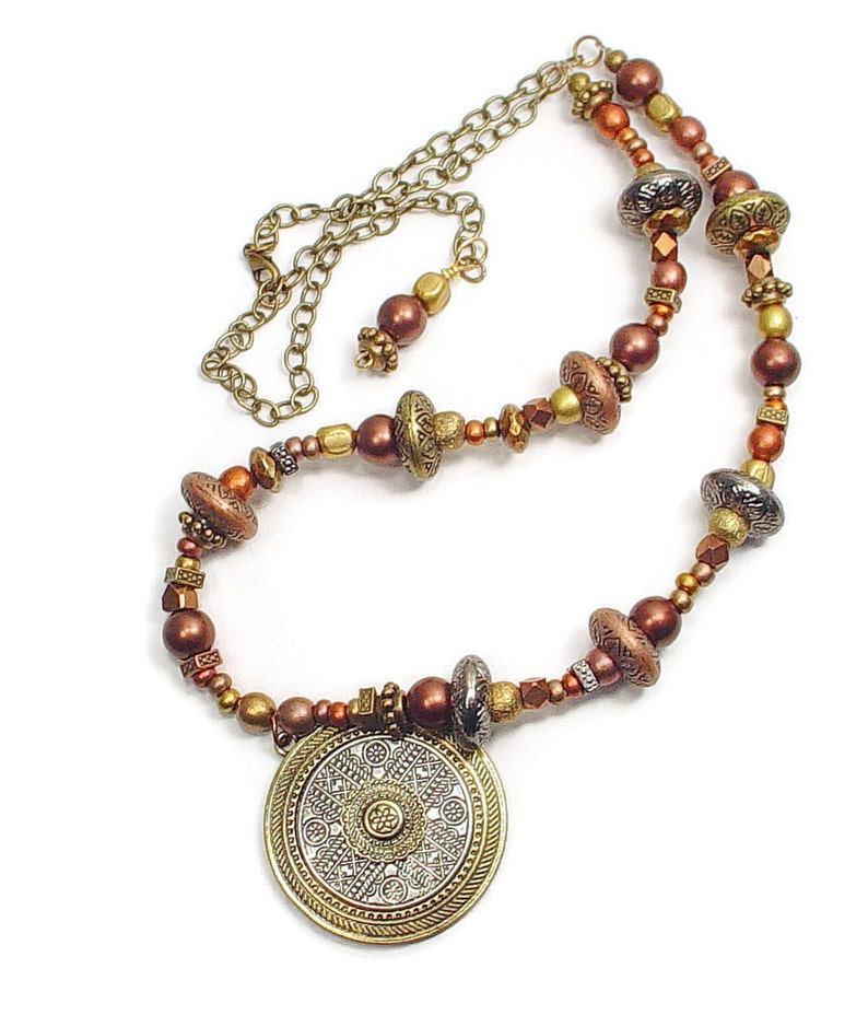 SOLD. Necklace with Gold and Silver Colored Metal Circular Pendant and Patterned Metal Beads and Antiqued Bronze Colored Chain image 2