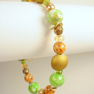 Bracelet with Crystal, Glass, Ceramic and Metal Beads in Tones of Green, Gold, and Brown with Magnetic Clasps image 3