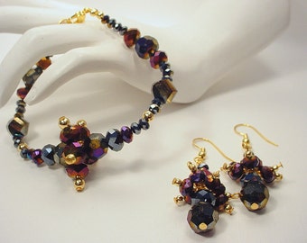 Purple Black  and Gold Crystal Bead  Bracelet with Aurora Borealis Finish
