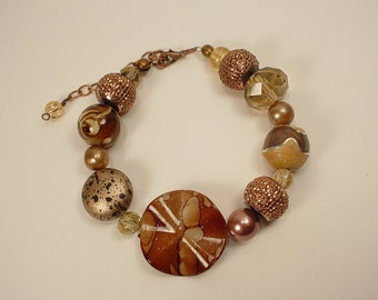 Eyecatching Bracelet with Sparkly Crystal, Pearls, Large Hole and Acrylic Beads in Shades of Brown, Beige and Gold