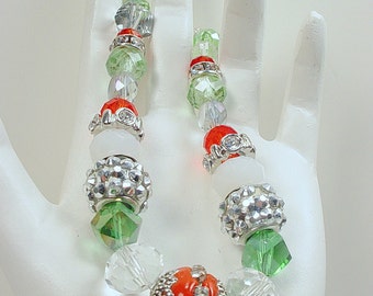 3 Bracelets with Crystal,  Kashmiri Beads, Bumpy Beads,  and More in Winter White and Holiday Colors.  Price is for EACH