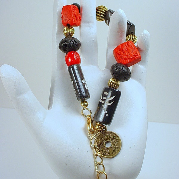 Bracelet with  Imitation Cinnabar Dragon Bead and Black Bone beads with Dragonfly in Red and Black and Gold