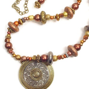 SOLD. Necklace with Gold and Silver Colored Metal Circular Pendant and Patterned Metal Beads and Antiqued Bronze Colored Chain image 3