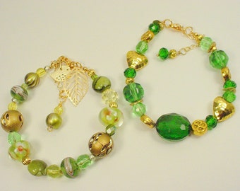 Bracelets with Emerald Green Sparkly Crystal, Rhinestone,Gold Plated Spacer ,and Lamp worked Beads.  Price is for EACH