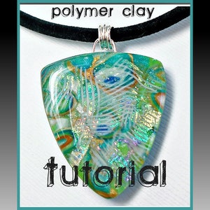 May include: A triangular polymer clay pendant featuring a faux dichroic effect with swirling patterns of teal, green, blue, and gold, suspended from a black cord by a silver-toned wire bail. The text "polymer clay" and "tutorial" are visible.