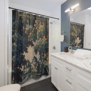 Add vintage charm to your bathroom with this stunning shower curtain, featuring a reproduction of an 18th-century Aubusson verdure tapestry. The lush woodland scene brings antique elegance to your bathroom decor, making it a perfect centerpiece for any bathroom renovation. Crafted from high-quality fabric, this bath curtain combines historic beauty with everyday functionality. Elevate your home decor with this unique tapestry-inspired bathroom accessory.