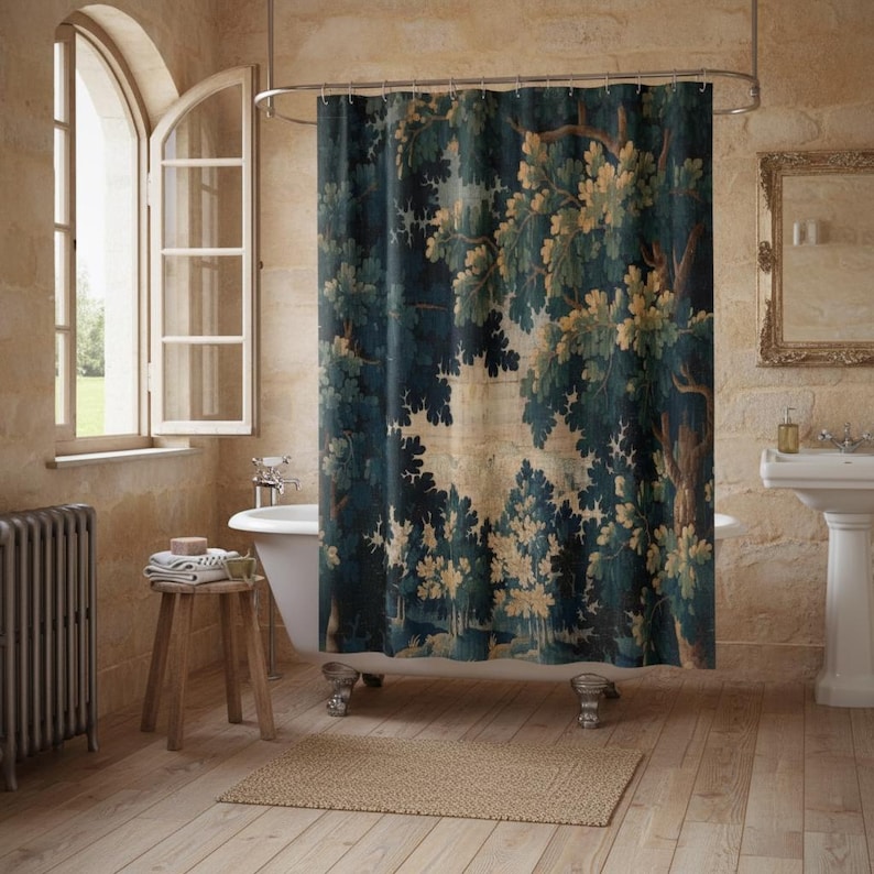 Add vintage charm to your bathroom with this stunning shower curtain, featuring a reproduction of an 18th-century Aubusson verdure tapestry. The lush woodland scene brings antique elegance to your bathroom decor, making it a perfect centerpiece for any bathroom renovation. Crafted from high-quality fabric, this bath curtain combines historic beauty with everyday functionality. Elevate your home decor with this unique tapestry-inspired bathroom accessory.