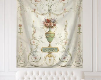 May include: A rectangular wall tapestry featuring a cream-coloured background with a central light green urn filled with a bouquet of pink and red flowers. The design includes symmetrical floral vines, swags, and a small rectangular plaque.