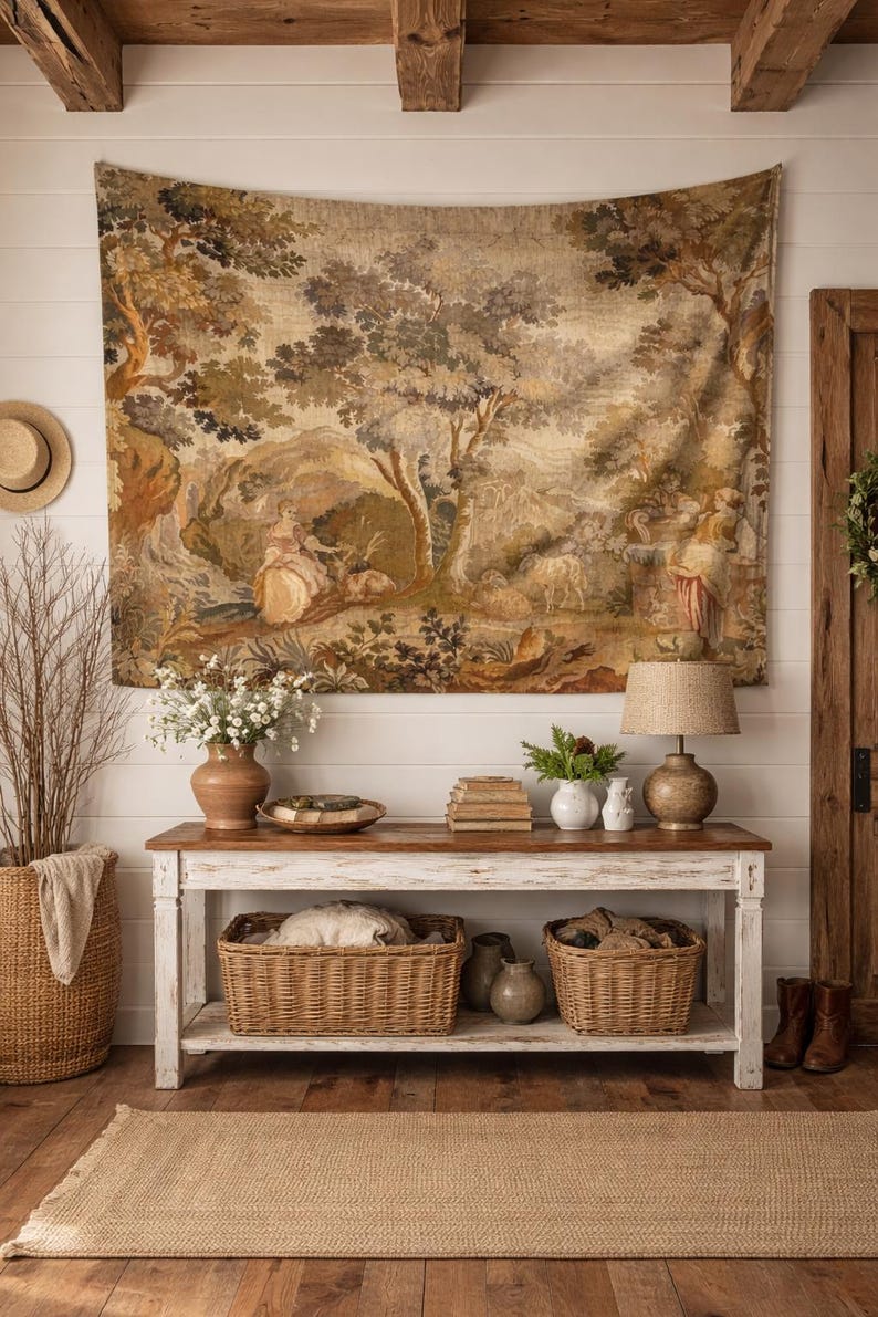 Bring timeless charm to your home with this 19th-century French verdure garden tapestry wall hanging. Featuring pastoral scenes, elegant figures, and lush foliage, this antique-style Aubusson piece adds a grandmillennial touch to any room. Perfect for French country, cottagecore, or vintage decor. Ideal for a living room, bedroom, or hallway. A statement piece for lovers of historic wall art, tapestries, and château interiors.