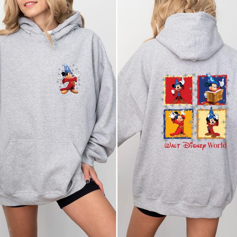 May include: A grey hooded sweatshirt with a Mickey Mouse illustration on the front and a larger Mickey Mouse illustration on the back. The back illustration features Mickey Mouse in four different poses, each in a different coloured square. The text "WALT DISNEY WORLD" is printed below the squares.