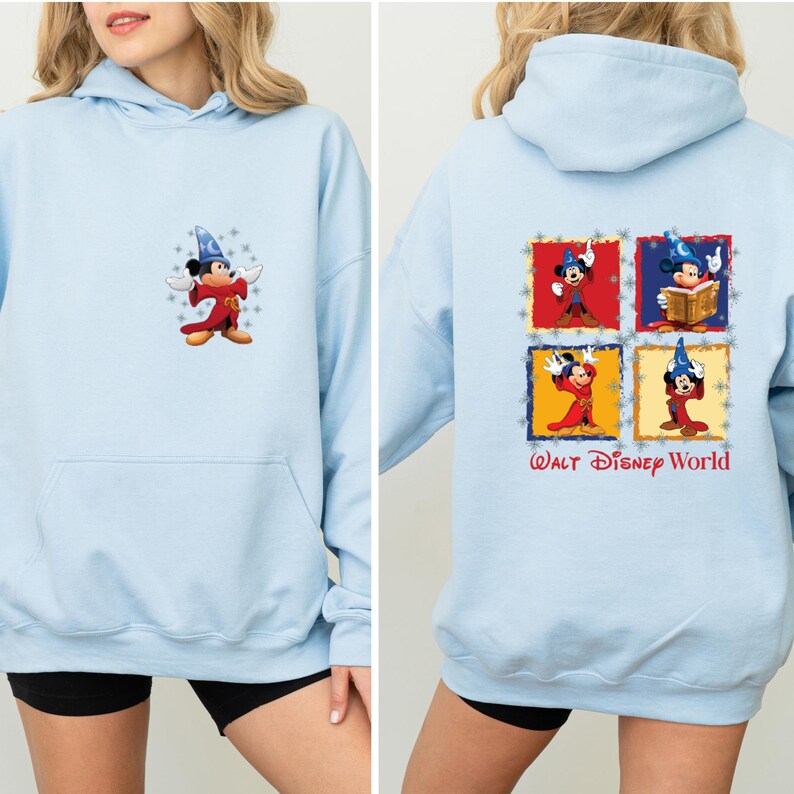 May include: Light blue hooded sweatshirt with a Mickey Mouse graphic on the front and a four-panel Mickey Mouse graphic on the back. The back graphic includes the text "Walt Disney World".