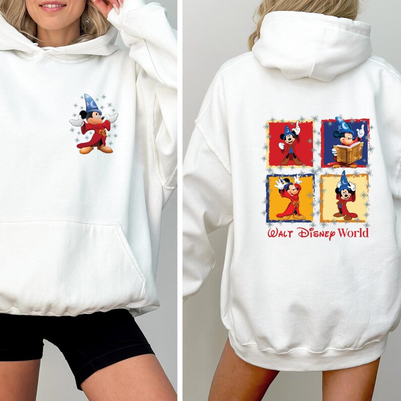 May include: White hooded sweatshirt with a Mickey Mouse graphic on the front and a multi-coloured Mickey Mouse graphic on the back. The back graphic features four different Mickey Mouse characters in different poses. The text "Walt Disney World" is printed below the graphic.