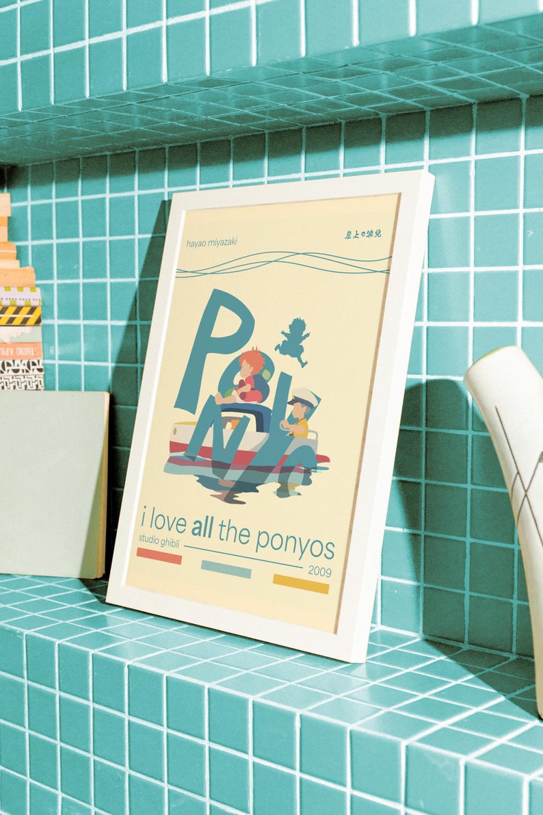 May include: A white framed poster with a yellow background featuring a cartoon illustration of two children in a boat with the text "Ponyo" in large letters. The poster also includes the text "i love all the ponyos", "hayao miyazaki", "studio ghibli", and "2009".