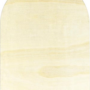 May include: Wooden arched wall decor. The wall decor is made of light-colored wood with a natural grain pattern. A metal hook is attached at the top for hanging. The shape is a rounded arch, suitable for various decorative purposes.