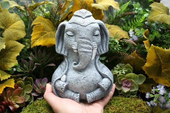 Yoga meditating elephant statue