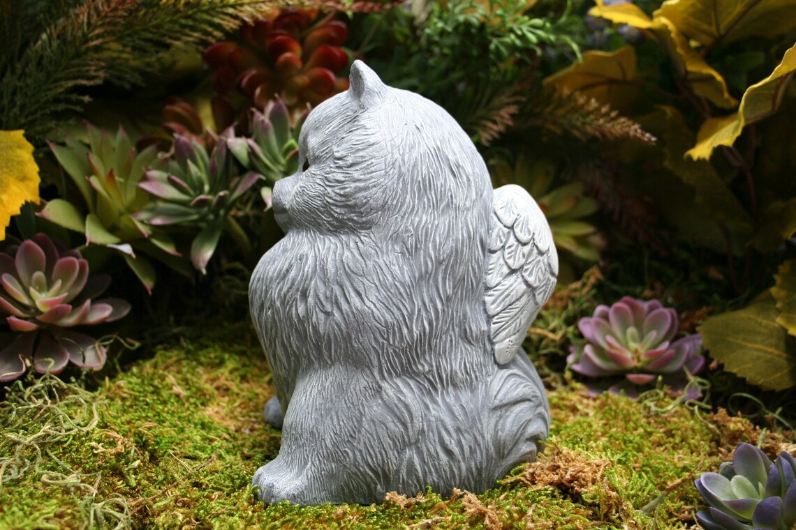 pomeranian statue with wings