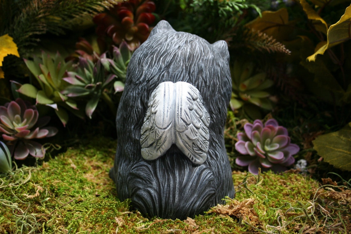 pomeranian statue with wings