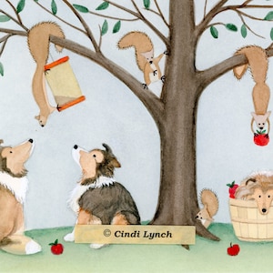 May include: A watercolor painting of a tree with three squirrels hanging from the branches. Two dogs are sitting on the ground looking up at the squirrels. One dog is in a basket with apples. The painting is signed "Cindi Lynch".