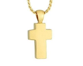 May include: A gold cross pendant necklace. The cross is simple and has a smooth, polished finish.