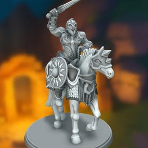 May include: A gray painted miniature figurine of a knight riding a horse. The knight is holding a sword and wearing armor. The horse has a saddle and a shield with a sun design.