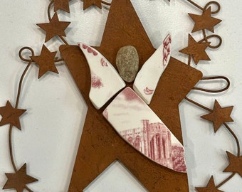 ANGEL Ornament created with slices of USMA china  on a Rusty Star