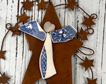 ANGEL Ornament created with slices of USMA china  on a Rusty Star