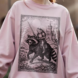 Toad Knight Riding Raccoon Shirt, Medieval Fantasy Frog T Shirt, Cottagecore Forestcore Tee, Whimsigoth Sweatshirt, Gothic Raccoon Hoodie