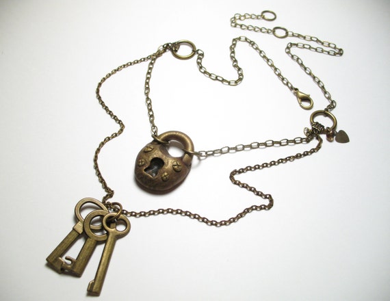A couple matching necklace sets I made. I tried to make the lock and key  look like antique metal! : r/polymerclay