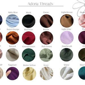 May include: A colour chart of fabric swatches in various colours, including navy, baby blue, black, cacao, light brown, nude pink, terracotta, burnt orange, red wine, raisin, light lilac, plum, dusty pink, natural, emerald green, pale green, sagebrush, olive, cream beige, eggplant, butter yellow, ivory, white, and steel blue.
