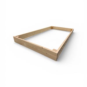 May include: A rectangular wooden frame, constructed from light-colored lumber, is presented against a white background. The frame is assembled with corner joints, showcasing the natural wood grain and texture. The design suggests a base or support structure.
