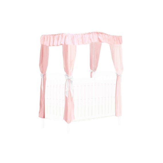 crib with drapes