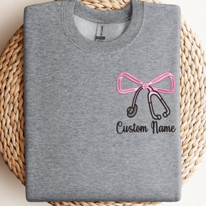 Custom Nurse Shirt with Embroidered Bow & Stethoscope – Personalized Gift for Nurses, Doctors and Healthcare Workers