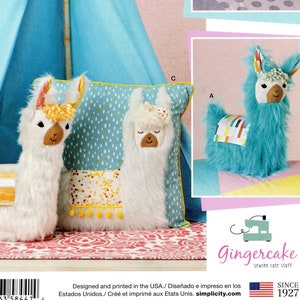 May include: A Simplicity sewing pattern for making a llama pillow and a llama toy. The pattern is for one size and includes instructions for making a blue tent with a white pom-pom trim.