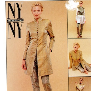 May include: McCall's sewing pattern featuring a woman in a gold-colored, long-sleeved jacket and matching pants. The pattern includes multiple views of the outfit. The text "NY" and "The Collection" are visible.