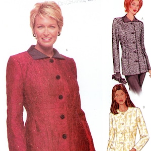May include: Butterick sewing pattern 3239 for a jacket with a collar and front buttons. The envelope displays a red textured jacket, a black and white patterned jacket, and a cream jacket with gold patterns, all featuring long sleeves and pockets.