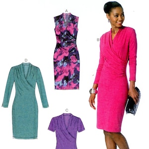 May include: McCall's sewing pattern M7186 features a woman in a pink dress with long sleeves. The pattern includes illustrations of dresses in various colors and styles, including a sleeveless floral print dress, a teal dress, and a purple dress. The size range is A5 (6-8-10-12-14).