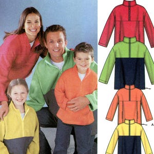 May include: Simplicity sewing pattern 9894 for fleece pullovers. The pattern includes sizes XS-XL. The image shows a family wearing the pullovers in red, green, orange, and yellow. The pattern also shows illustrations of the pullover designs.