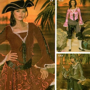 May include: Simplicity sewing pattern 4914 for adult costumes. The package features illustrations of pirate-themed outfits including a brown dress with red swirl patterns, a pink blouse with black pants, and a grey top with a dark skirt.