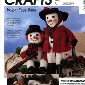 May include: McCall's Crafts pattern for winter-themed decorations. The image features two snowmen, one seated with a broom, and a basket with gingerbread figures. The pattern includes instructions for making gingerbread ornaments and snowmen, with text in English and French.
