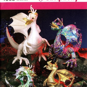 May include: A sewing pattern for making four different dragon stuffed toys. The dragons are white, gold, green and purple with colorful patterns. The pattern is Simplicity 4063, one size.