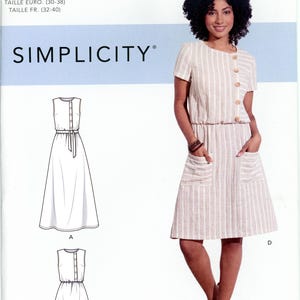 May include: Simplicity sewing pattern S8914 for a dress with a round neckline, short sleeves, and a button-front bodice. The design features a gathered waist, two large patch pockets on the skirt, and a vertical striped pattern in beige and white.