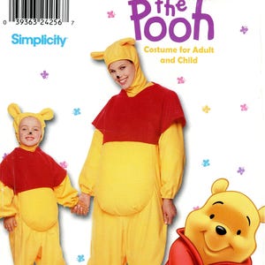 May include: A Simplicity pattern for Winnie the Pooh costumes for adults and children. The image shows a child and an adult wearing yellow and red Pooh Bear costumes. The pattern includes sizes 3-8/XS-XL.