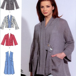 May include: Simplicity pattern S8917 features a woman wearing a gray jacket with large pockets and a draped collar. The pattern includes variations of jackets in different colors and styles. The pattern size is XS-XL.