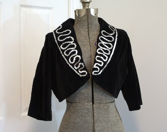 1950s black velvet bolero shrug jacket with silver sequins and shawl collar M