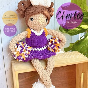 May include: A crocheted doll dressed as a cheerleader with brown hair, a white bow, and a purple and white uniform. The doll holds two pom-poms in purple, white, and orange. Text on the image reads A TEA PARTY FRIENDS DOLL, LOW-SEW, THE FULL PATTERN, and Chartee CHEERLEADER.